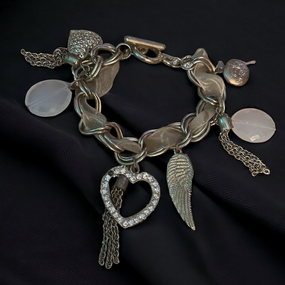Silver tone ribbon charm bracelet